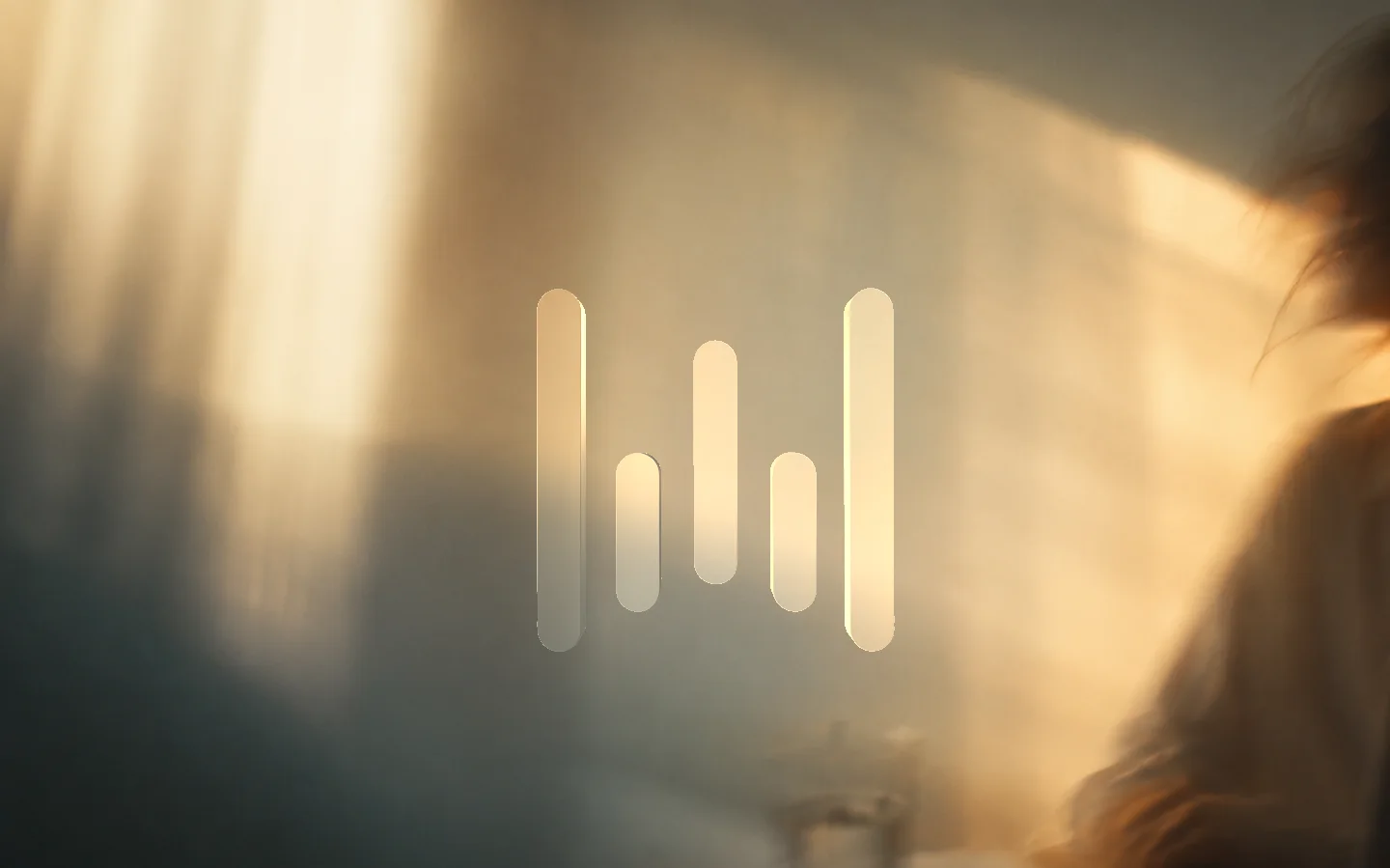 The Wispr Flow mark in frosted glass, catching golden-hour light
