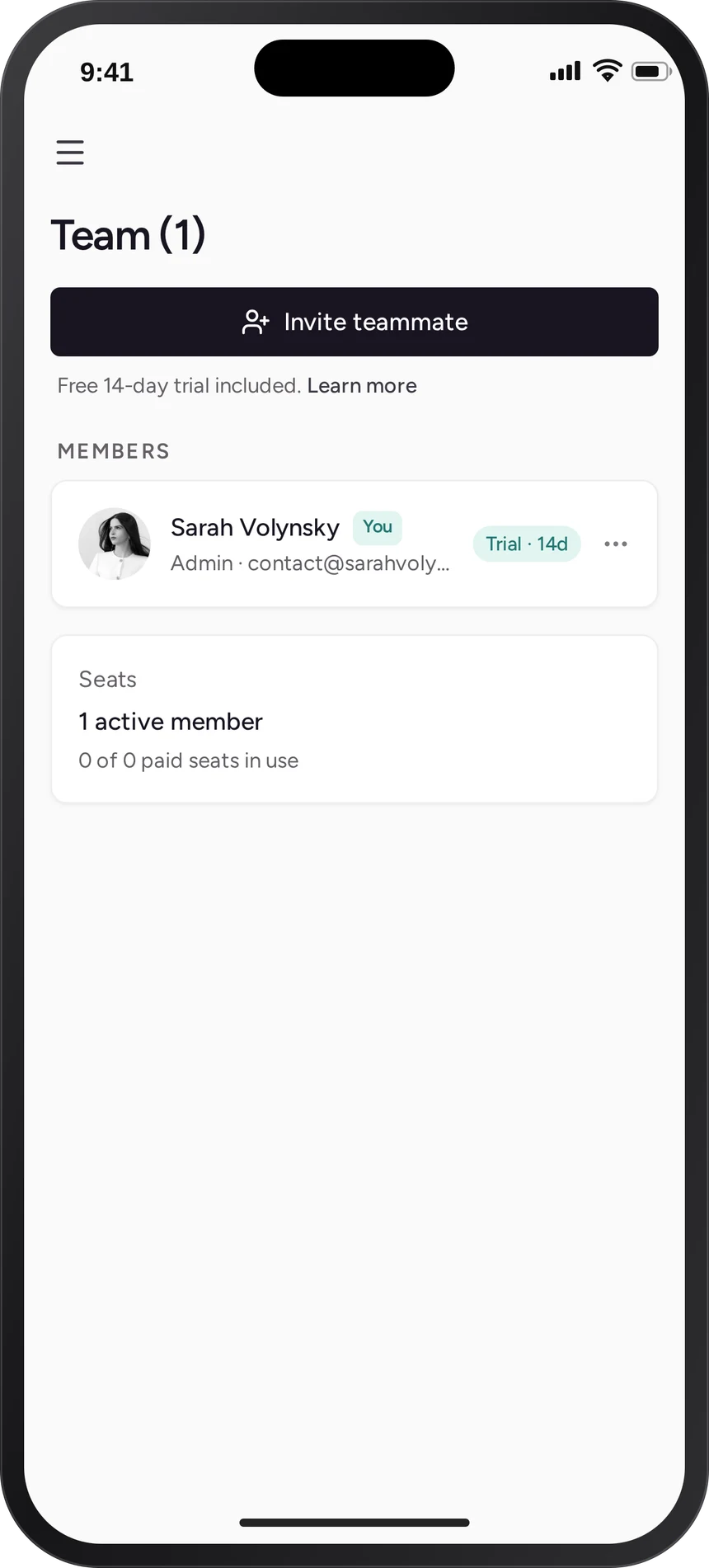 The team screen: an invite button, a member list with role and trial status, and a seats summary